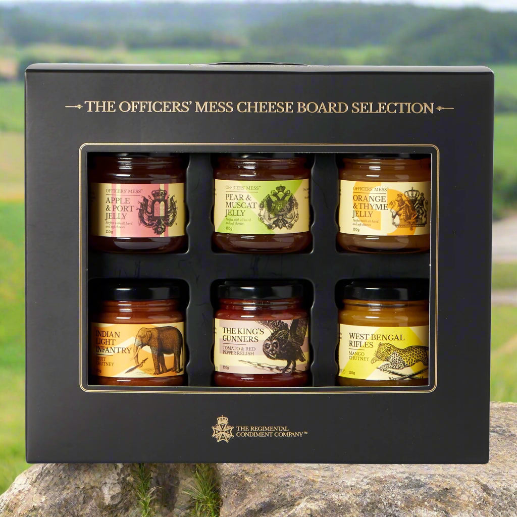 Set of six jars of preserves in a decorative box with visible branding.