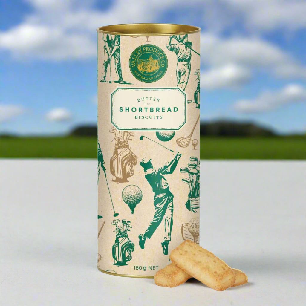 Cylindrical tin of butter shortbread biscuits with golf-themed design on a white background