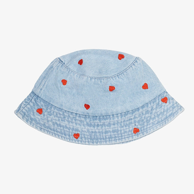 Light blue denim bucket hat with red heart patterns on a white background