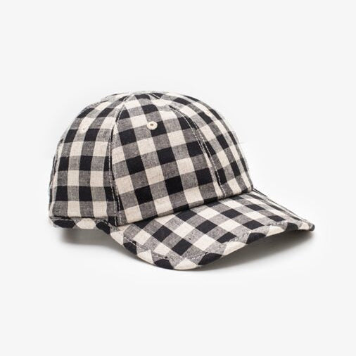 Black and white checkered baseball cap on a white background