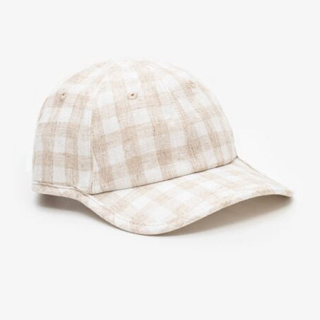 Plaid patterned cap on a white background
