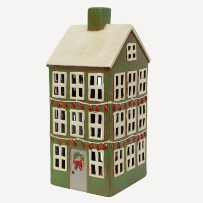 Decorative house-shaped container with a green roof and base, white walls, and red trim on a white background.