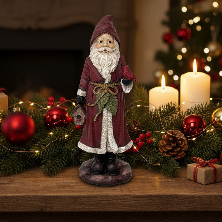 Decorative gnome figure in a red coat holding a birdhouse on a white background