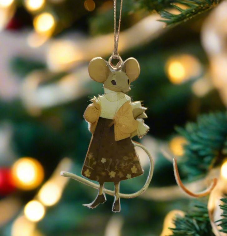 Decorative mouse ornament with a gold dress on a white background