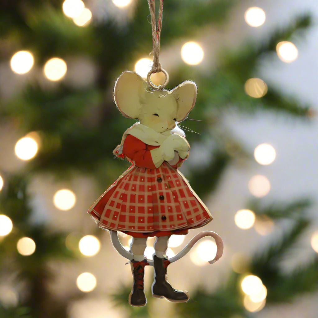 Decorative mouse ornament in a red dress with a white background
