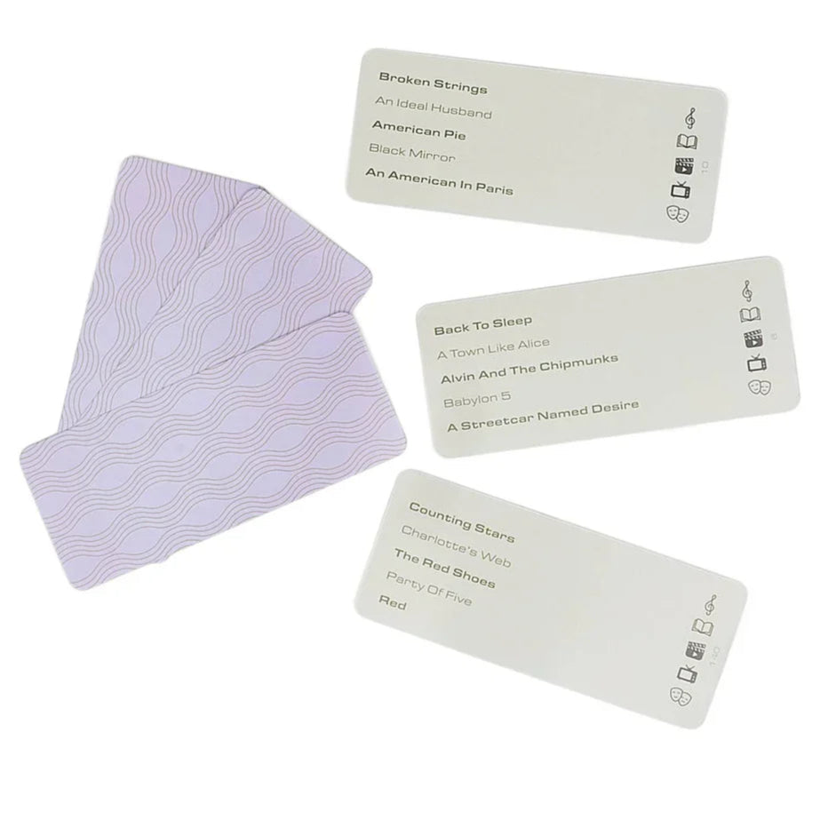 Set of business cards with a purple card on a white background