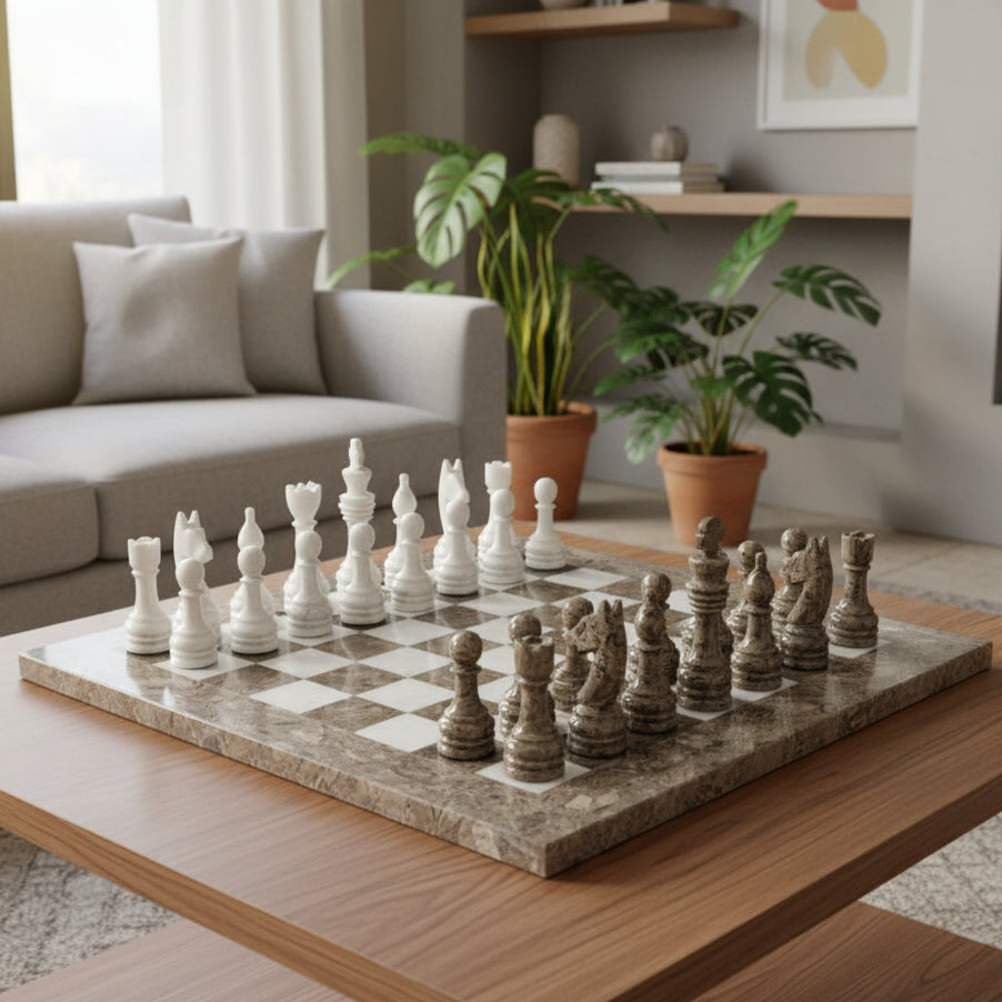 Marble chessboard with white and gray chess pieces on a white background