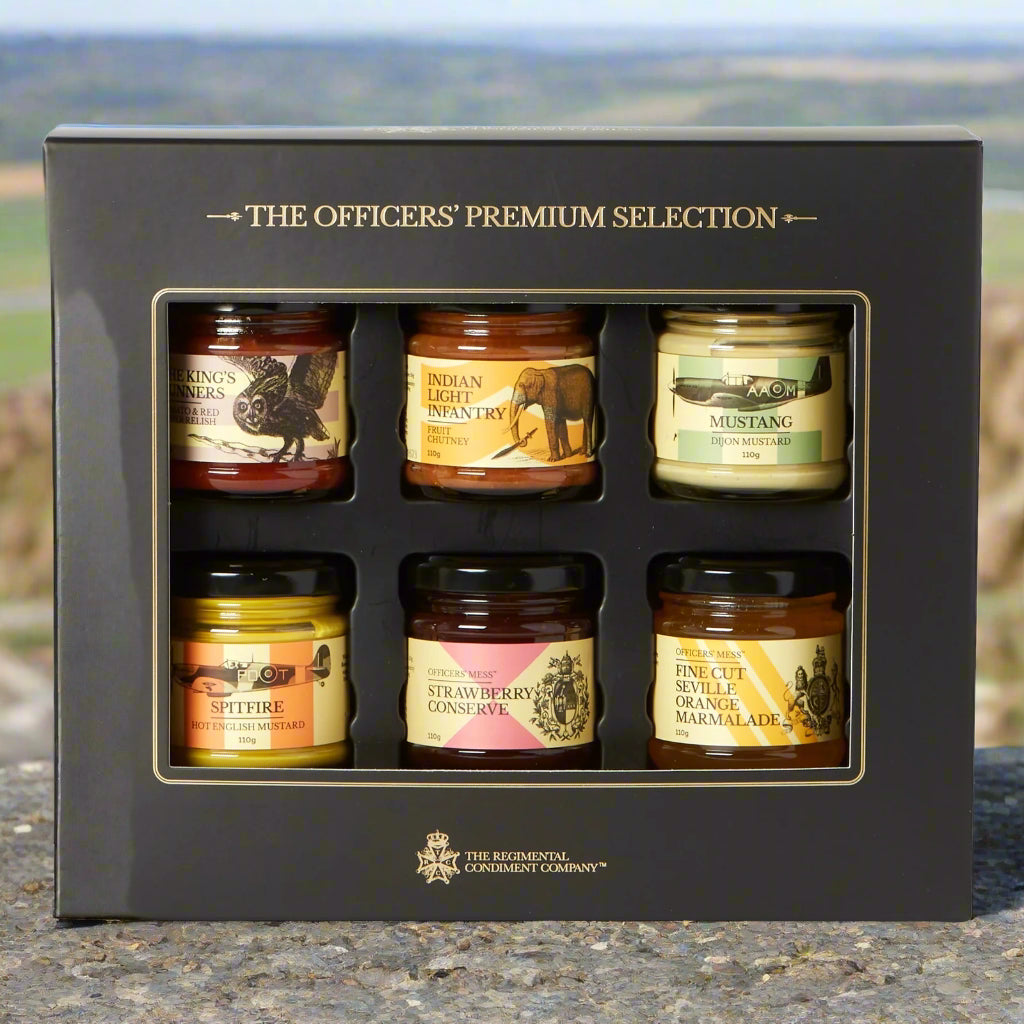 Set of six jars in a decorative box labeled 'The Officers' Premium Selection' with visible brand names.