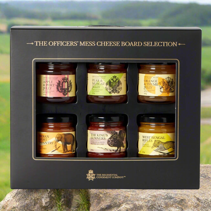 Set of six jars of preserves in a decorative box with visible branding.
