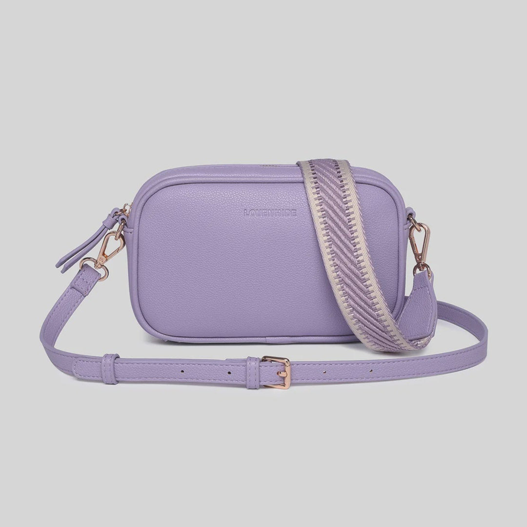 Purple handbag with a strap on a light gray background