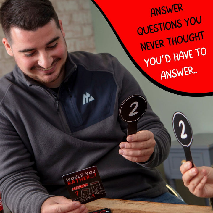Would You Rather? game being played with voting paddles - RAPT ONLINE