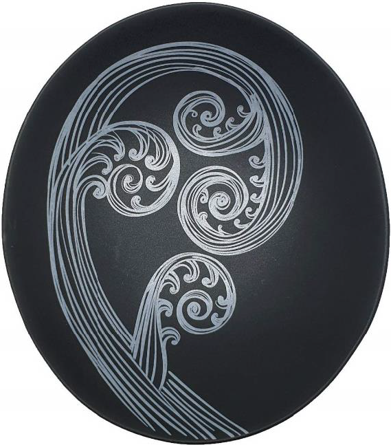 White ponga on black bowl angle