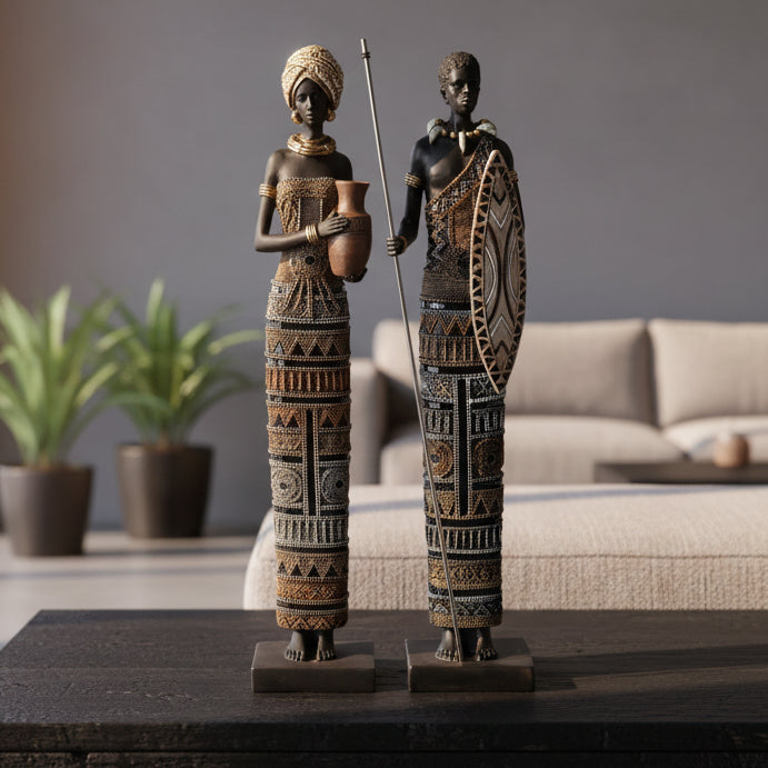 Two decorative figures with intricate patterns on a white background