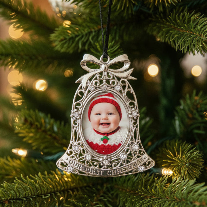 Decorative bell-shaped photo frame with a bow on a white background