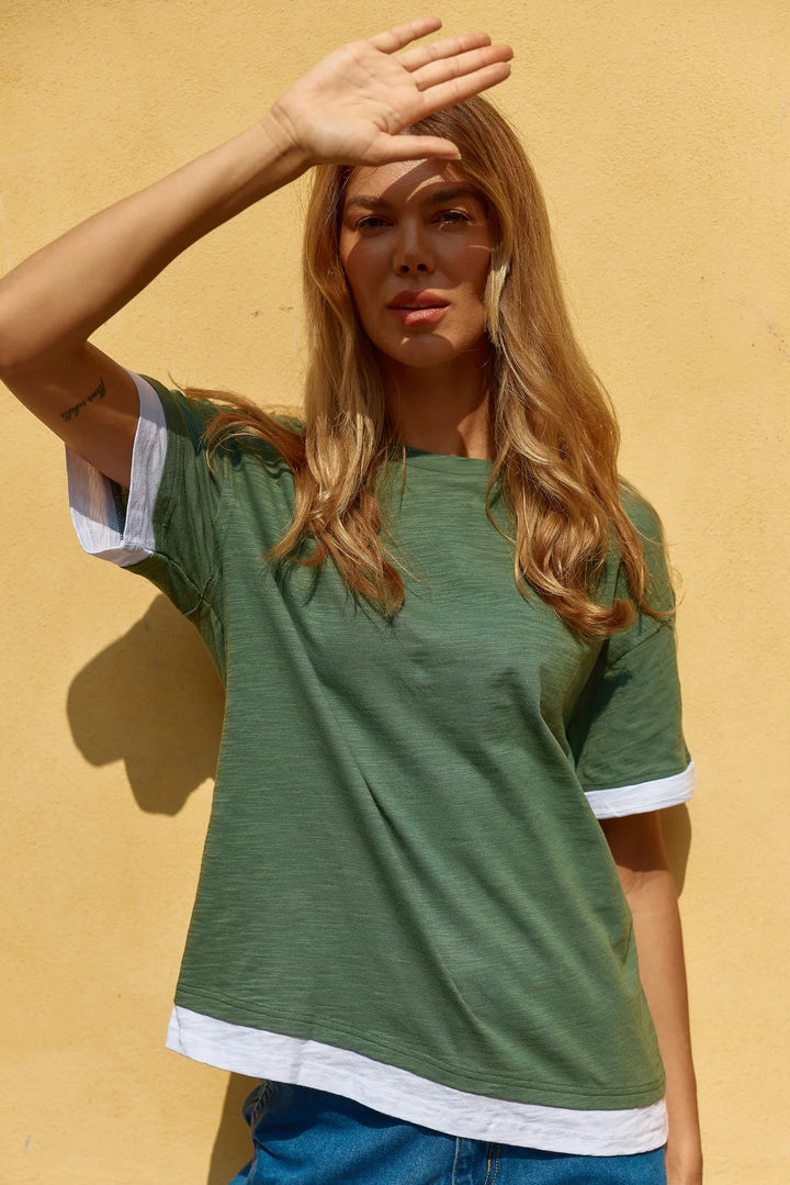 LADY WEARING GREEN TEE WITH WHITE