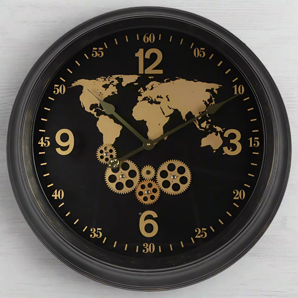Wall clock with world map and gears design on a black background