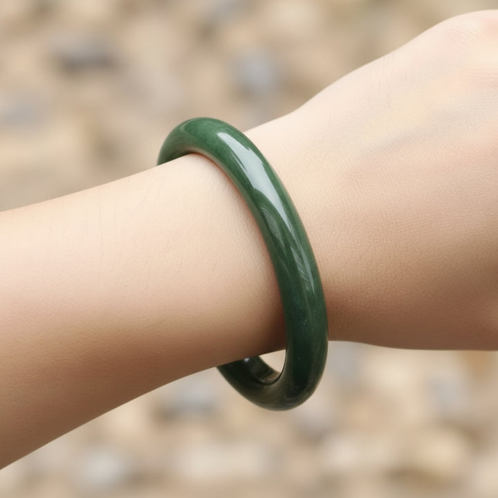 greenstone bangle on a wrist