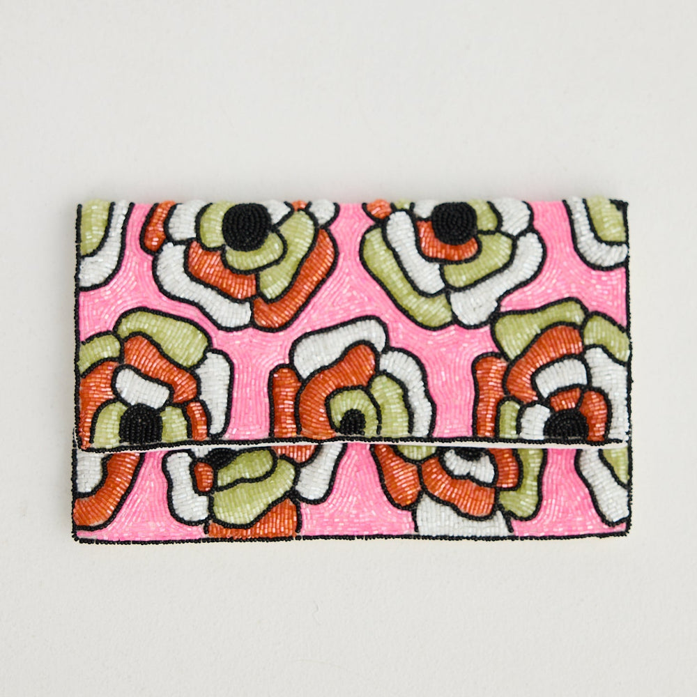 Floral patterned pouch on a light gray background