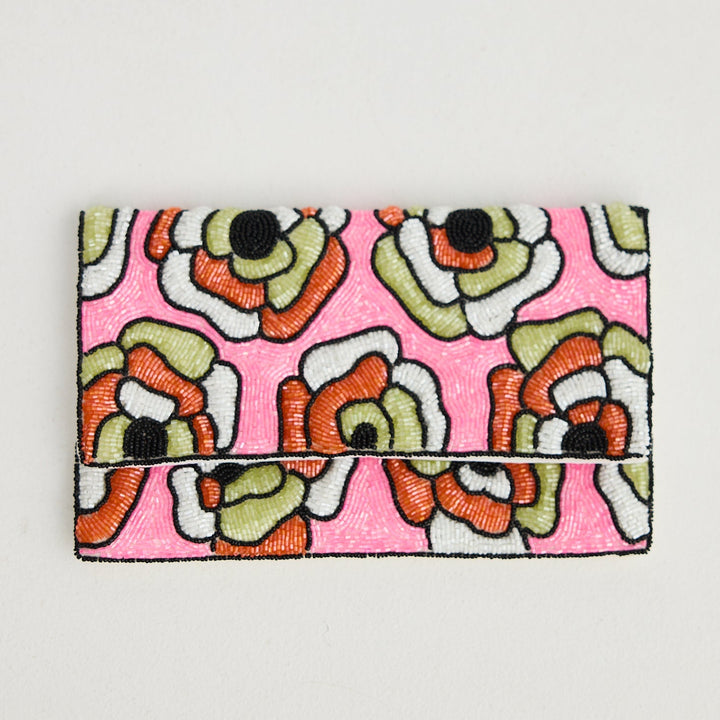 Floral patterned pouch on a light gray background