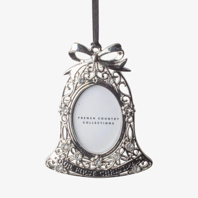 Decorative bell-shaped photo frame with a bow on a white background
