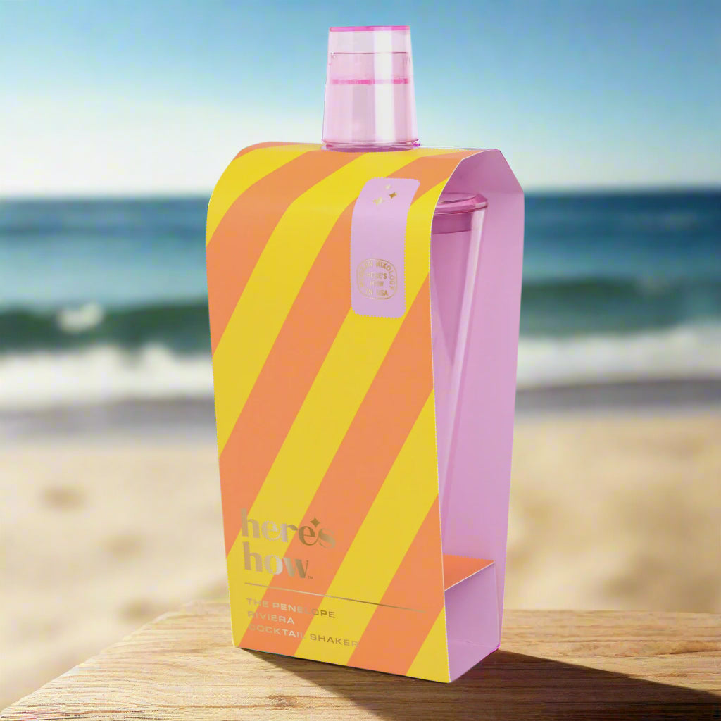 Colorful striped bottle packaging with a pink cap on a light gray background