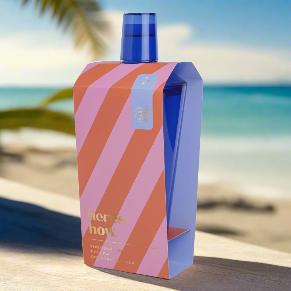 Colorful packaging with diagonal stripes and 'heres now' branding on a white background