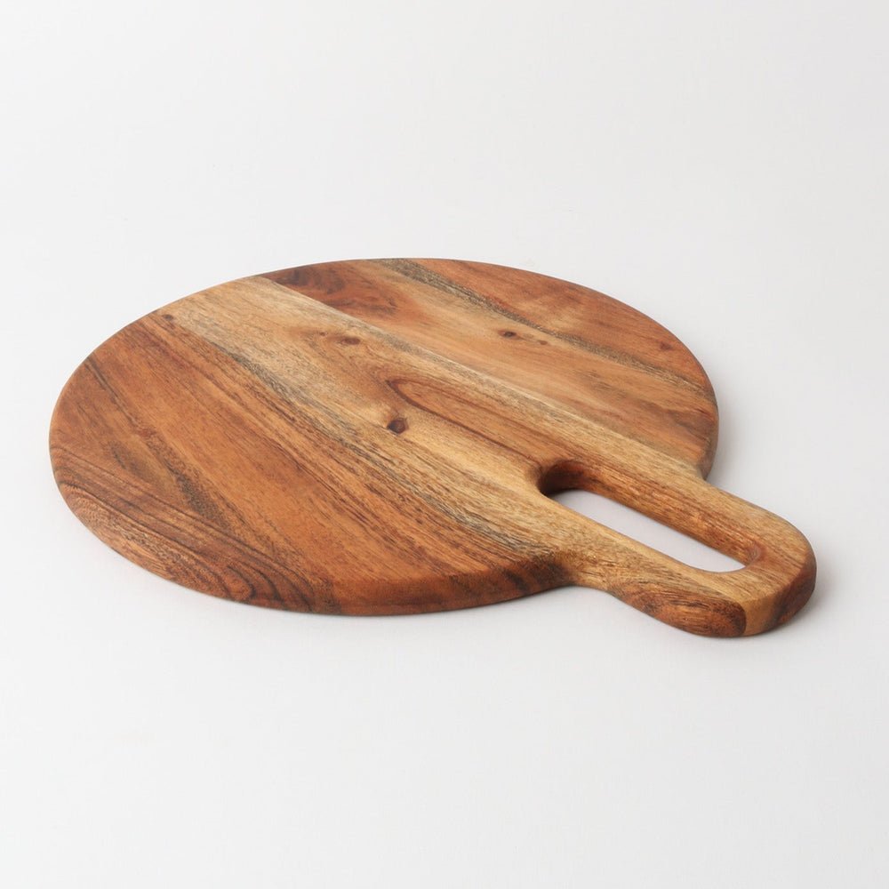 Wooden cutting board with handle on a white background