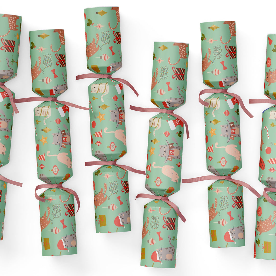 Set of green CAT CHRISTMAS Christmas crackers with festive designs on a white background