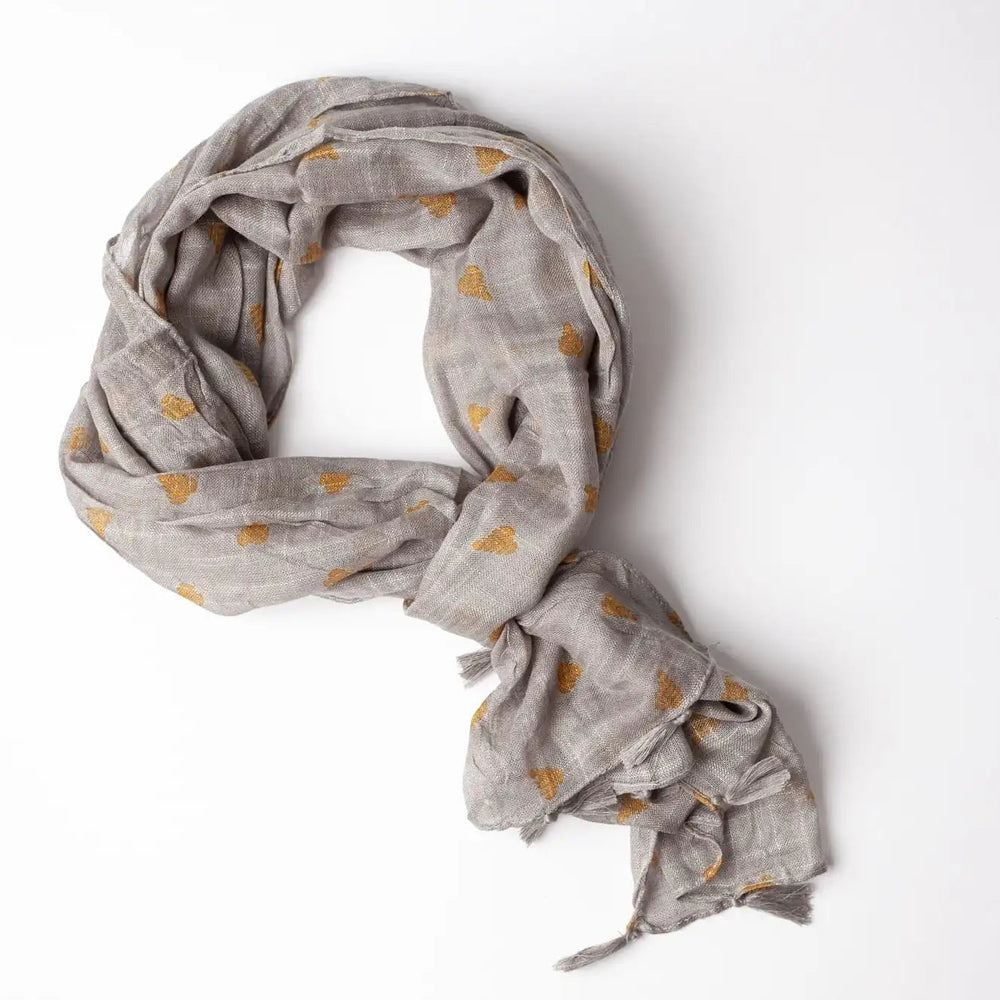 Gray scarf with gold polka dots on a white background