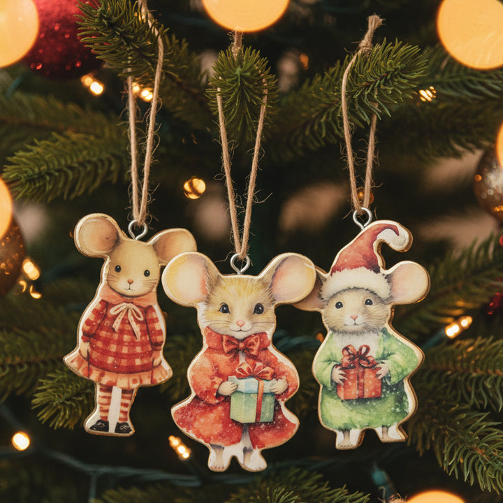 Three decorative mouse ornaments on a white background