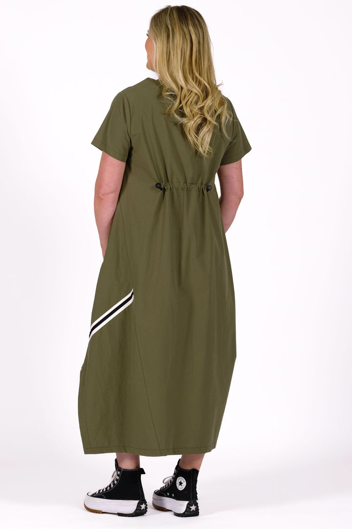 Woman wearing a green dress with a white background