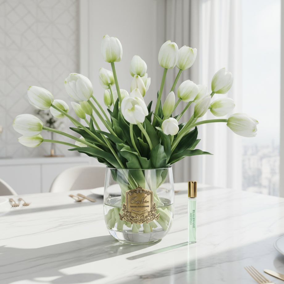 Glass vase with Cote Noire white tulips and a small bottle of tulip fragarcne for teh flower diffuser.