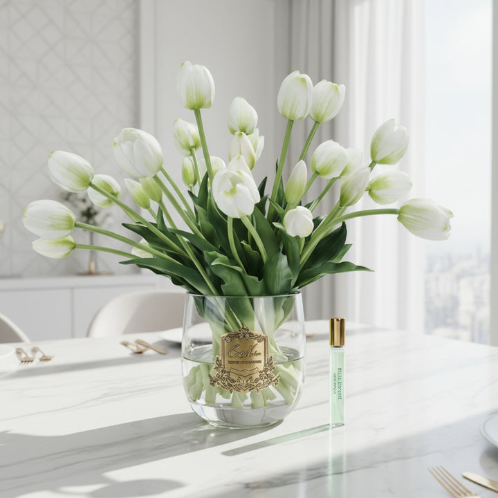 Glass vase with Cote Noire white tulips and a small bottle of tulip fragarcne for teh flower diffuser.