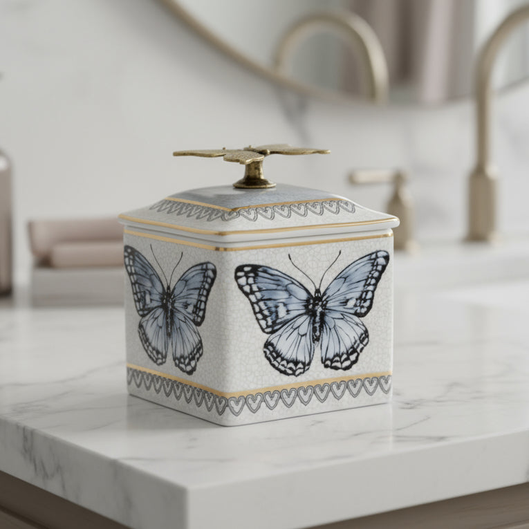 Decorative box with butterfly design and matching napkin in the corner