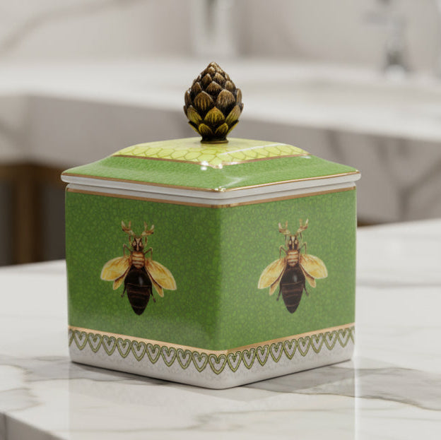 Decorative jar with bee design on a green background