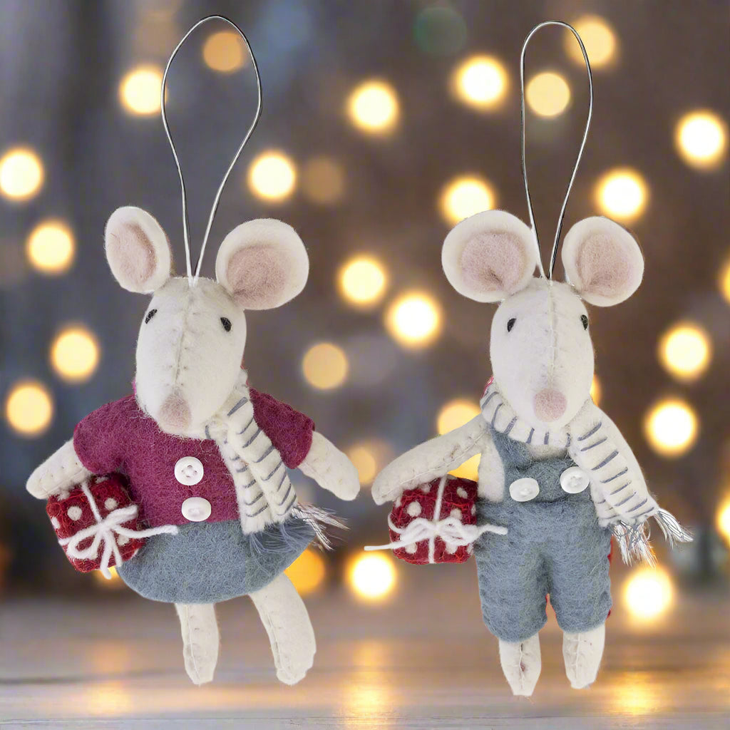 Two plush mouse ornaments wearing winter clothing on a white background