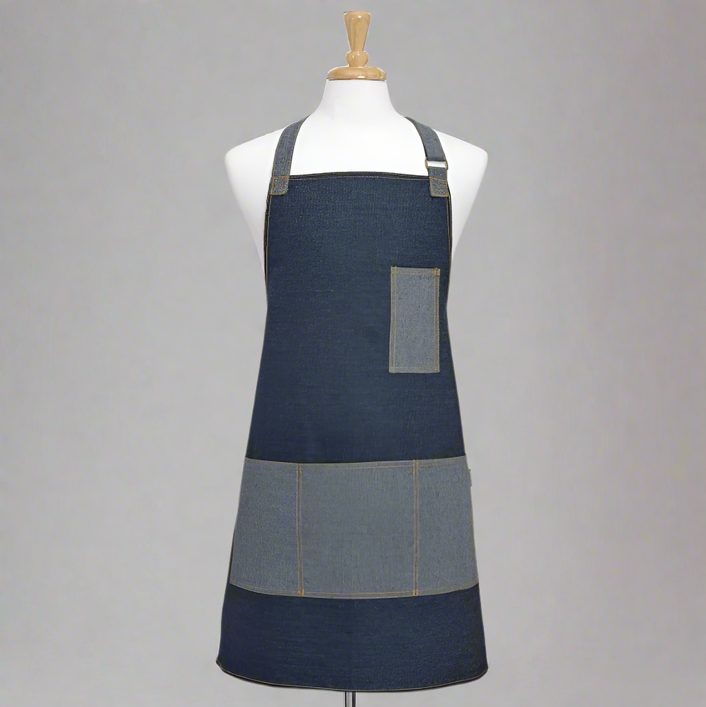 Denim apron on a mannequin against a white background
