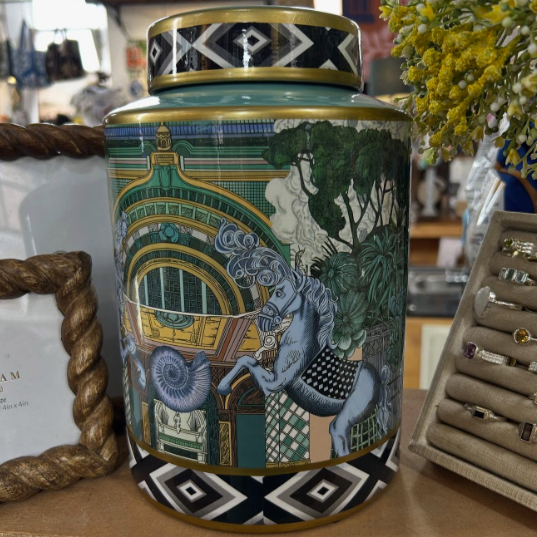 Decorative jar with intricate design on a surface