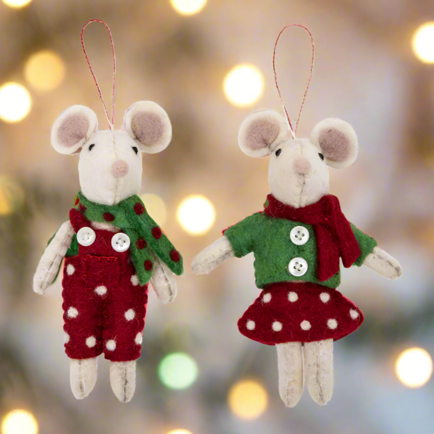 Two mouse ornaments dressed in red and green clothing with polka dot patterns on a white background.