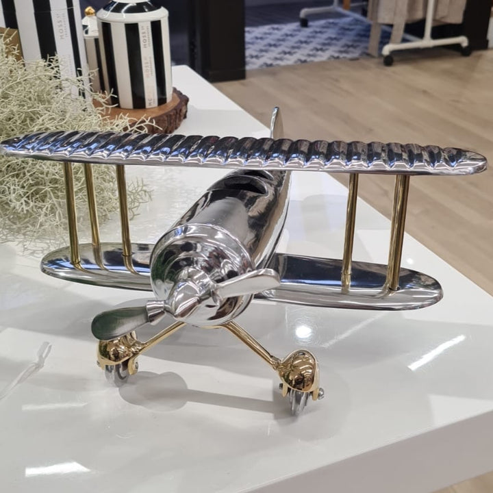 Decorative airplane model on a table with a blurred background
