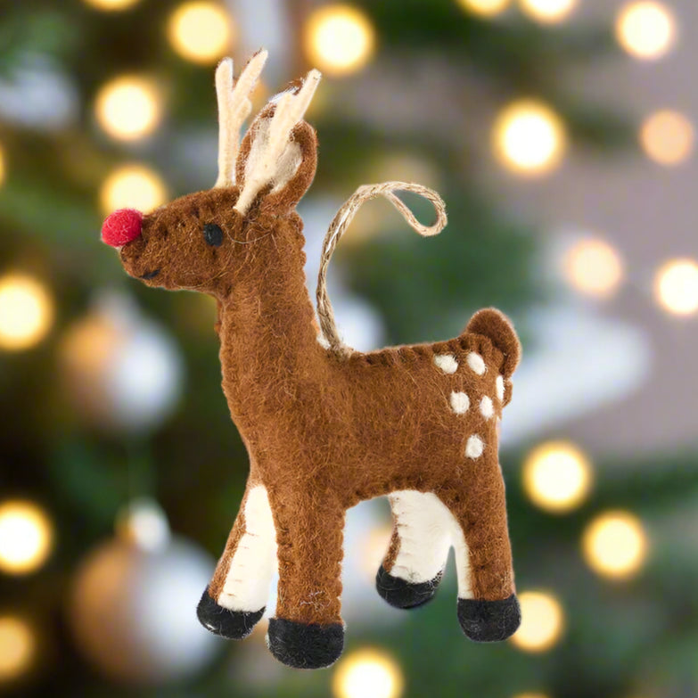 Felt reindeer ornament on a white background