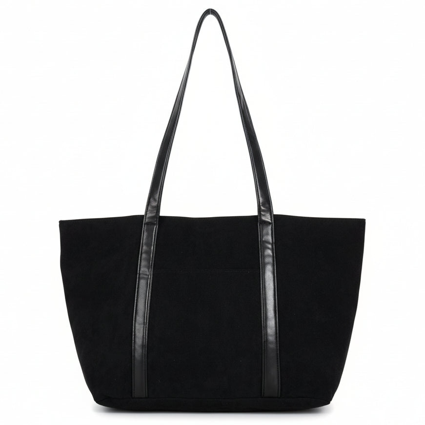 Black tote bag with contrasting black handles on a white background
