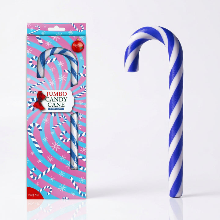 A blue and white striped jumbo bubblegum candy cane shown next to its retail packaging on a white background, with text indicating 23 cm length and Christmas-themed branding.