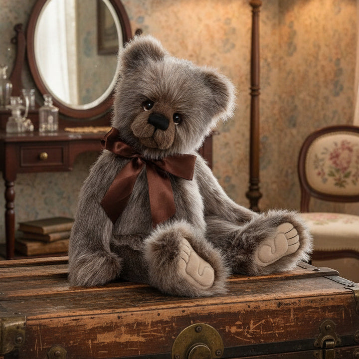 Stuffed charlie bears collectbale teddy bear with a brown bow tie on a white background