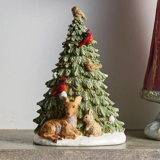 tree with birds deer rabbit ornament on a mantel