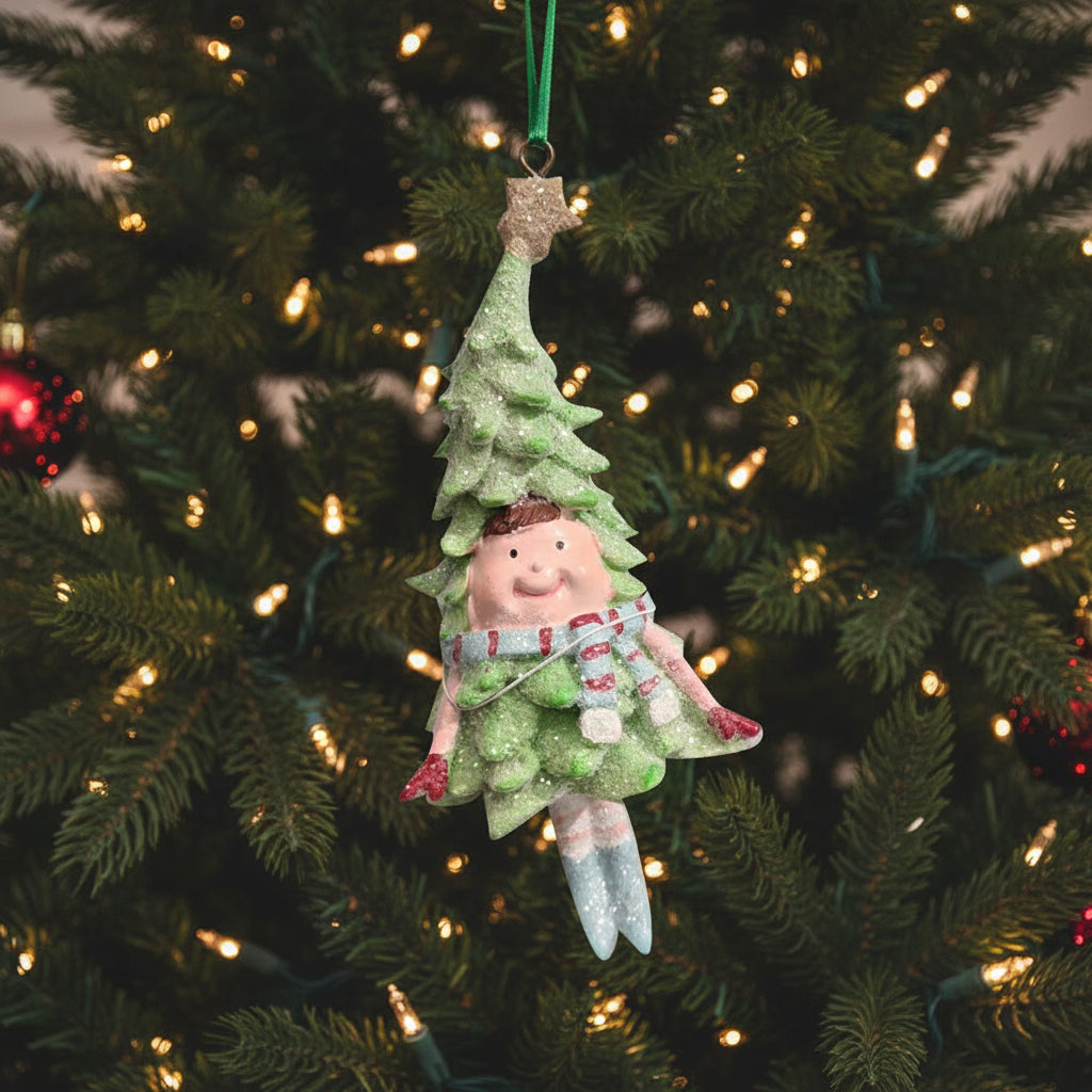 Decorative Christmas tree-shaped ornament with a character inside on a white background