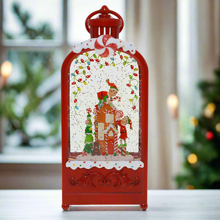 Decorative Christmas lantern with gingerbread man and candy cane theme on a white background