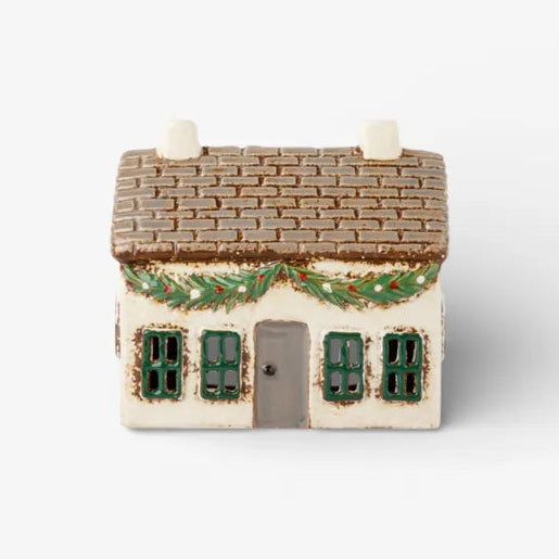 Small model of a house with a white base, brown roof, and green windows on a white background.