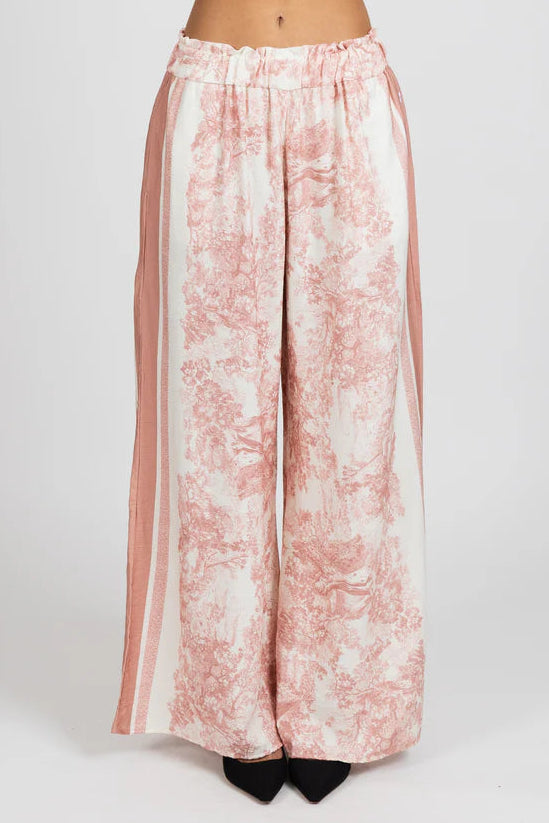 Floral print pants on a white background