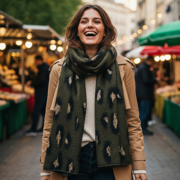 Dark green scarf with abstract pattern on a white background